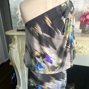 Stunning off the shoulder one sided floral mini dress.